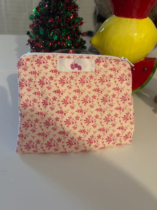 pochette à zip fleur rose