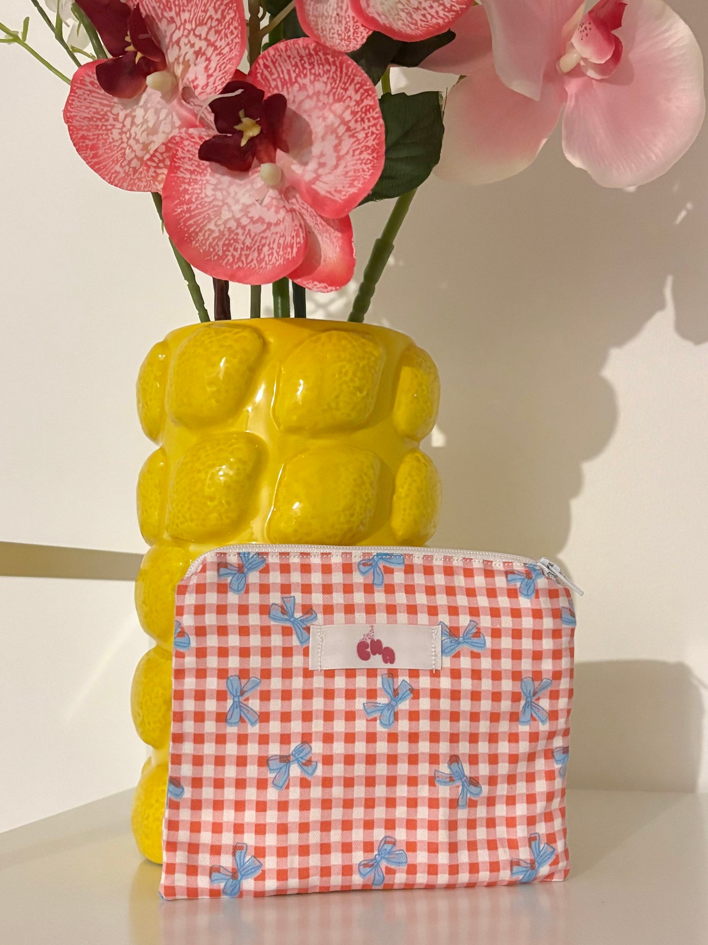 pochette à zip noeuds rose