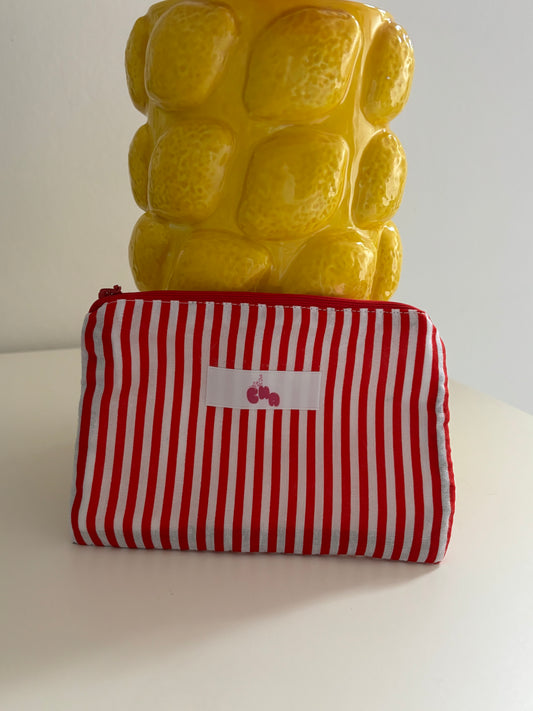 pochette à zip rayure rouge