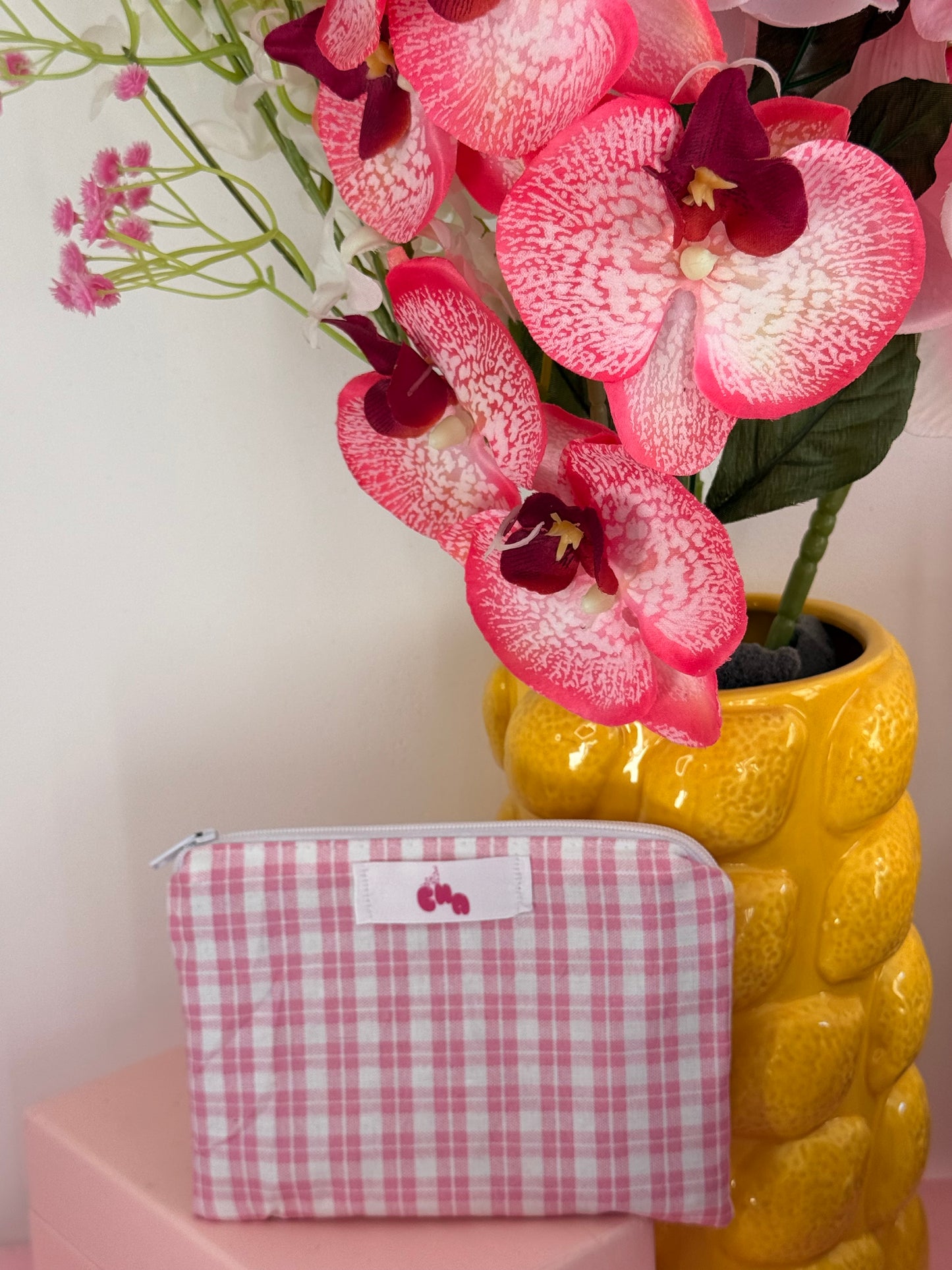 pochette carreaux roses